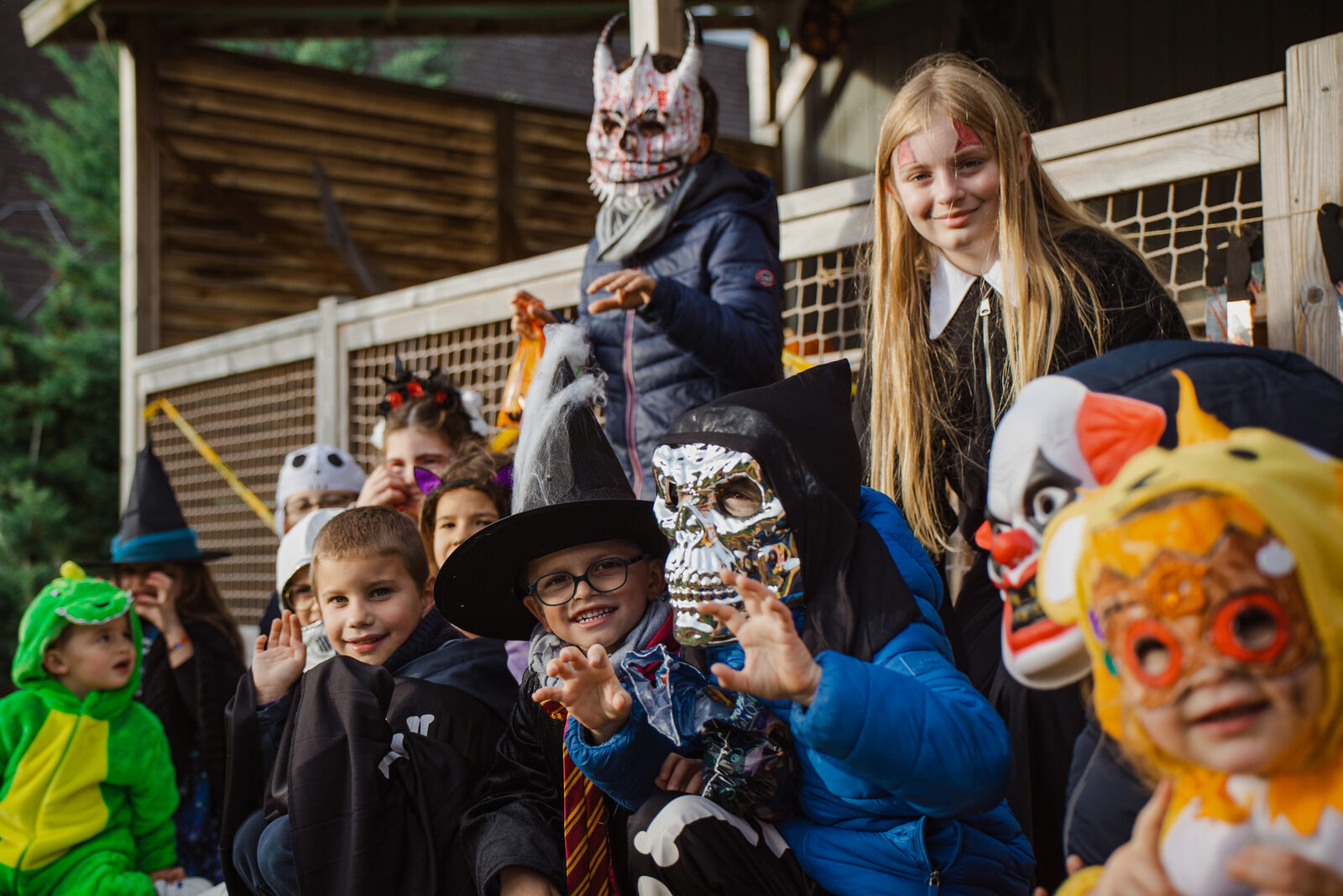 Families and activity leaders gathered under the campsite's covered area for Halloween