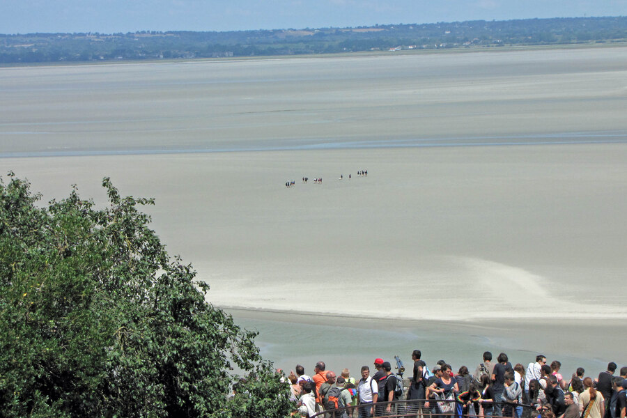 The bay of Mont-Saint-Michel at low tide and its vast sands
