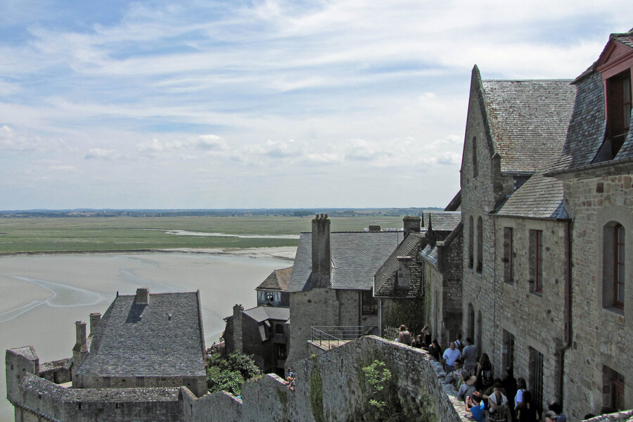 The ramparts and houses of the village of Mont-Saint-Michel, facing the bay